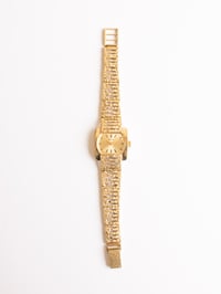 Image 1 of 70s enicar gold "nugget"