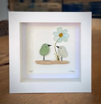 Seaglass birds with seaglass daisy