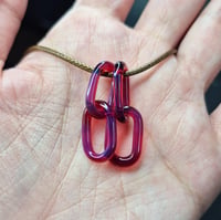 Image 1 of PURP RED LINK BEADS