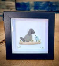 Grey pebble puppy with seaglass bird 
