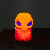 Image 2 of Gus skelly- red orange/ purp eyes 