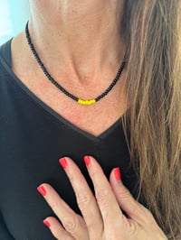 Image 2 of Black Yellow Puka
