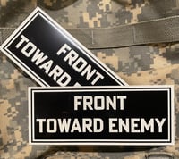 Image 1 of FRONT TOWARD ENEMY AMP/CAB BADGE