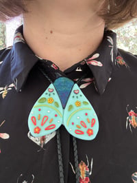 Bright Blue Moth Bolo