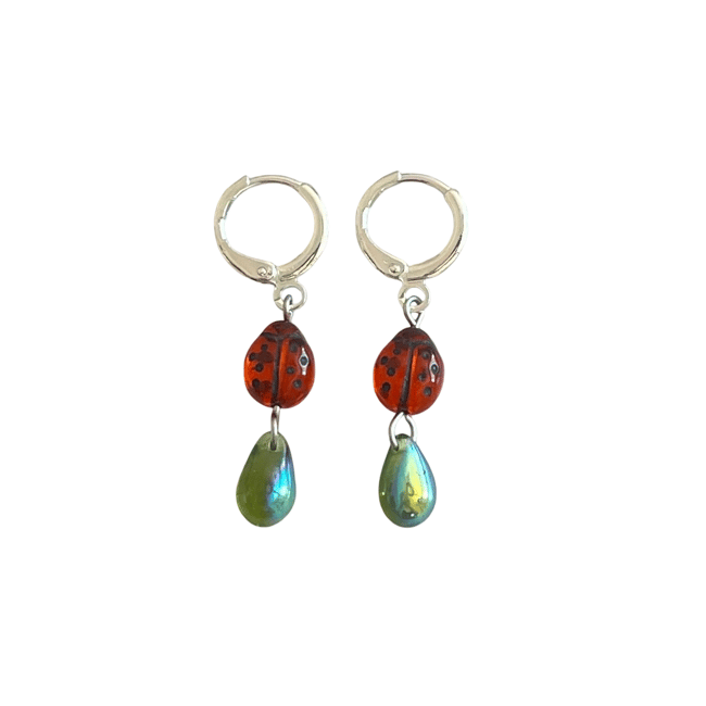red ladybug and green teardrop huggie hoop earrings