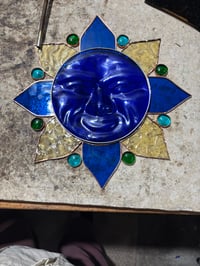 Image 1 of Molded face Sun