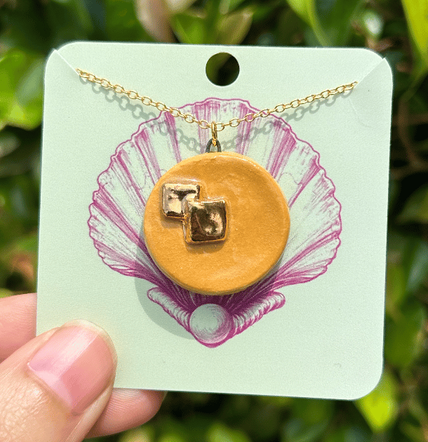 Image of Porcelain Pancake with Gold Butter Pendant