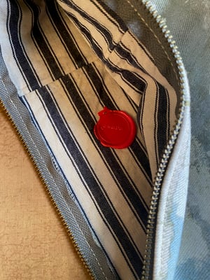 Image of white sails pouch