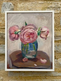 Image 6 of Pink roses in mustard jar on table