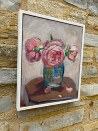 Image 8 of Pink roses in mustard jar on table