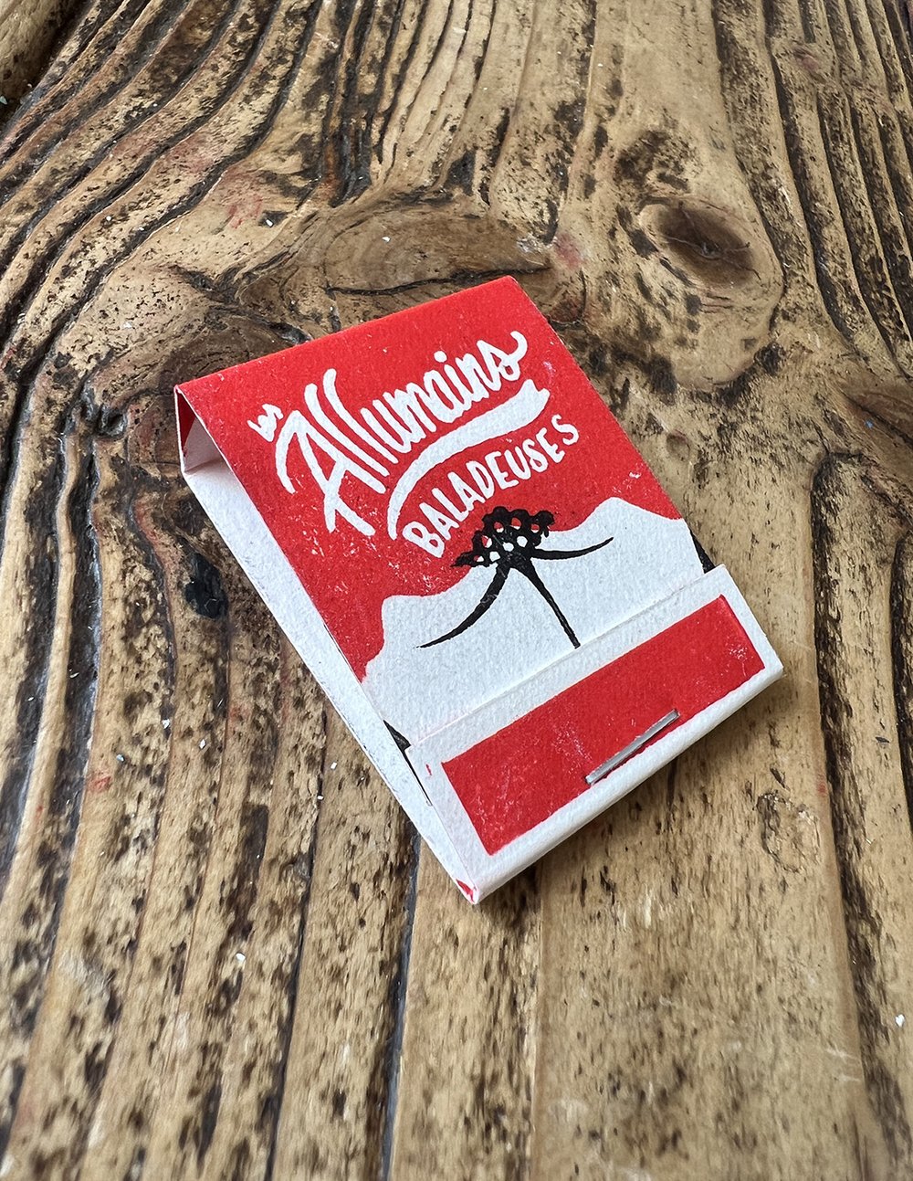 Image of "Les Allumains balladeuses" linocut cutout (fake) matchbook