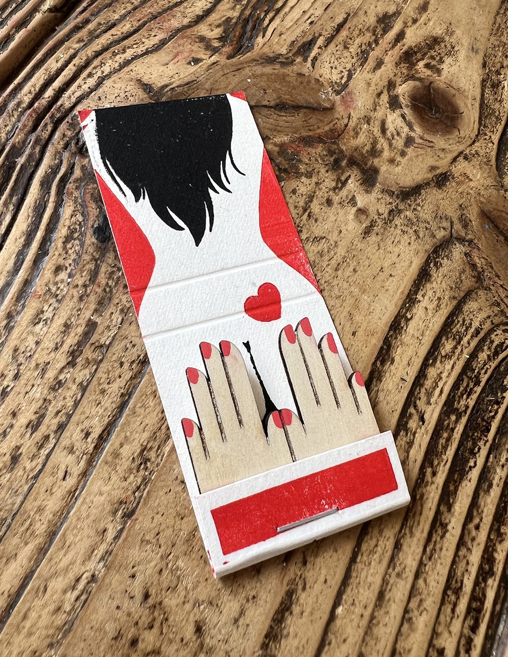 Image of "Les Allumains balladeuses" linocut cutout (fake) matchbook