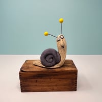 Image 3 of Snail with Yellow balls