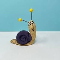 Image 5 of Snail with Yellow balls