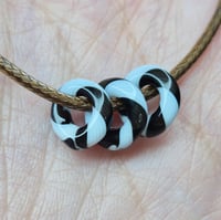 Image 2 of BLK N WHT SPACERS SET