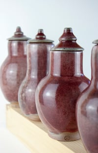 Image 2 of Four stoneware red vases