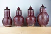 Image 3 of Four stoneware red vases