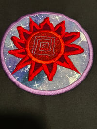 Image 3 of Sunburst in a galaxy of darkness