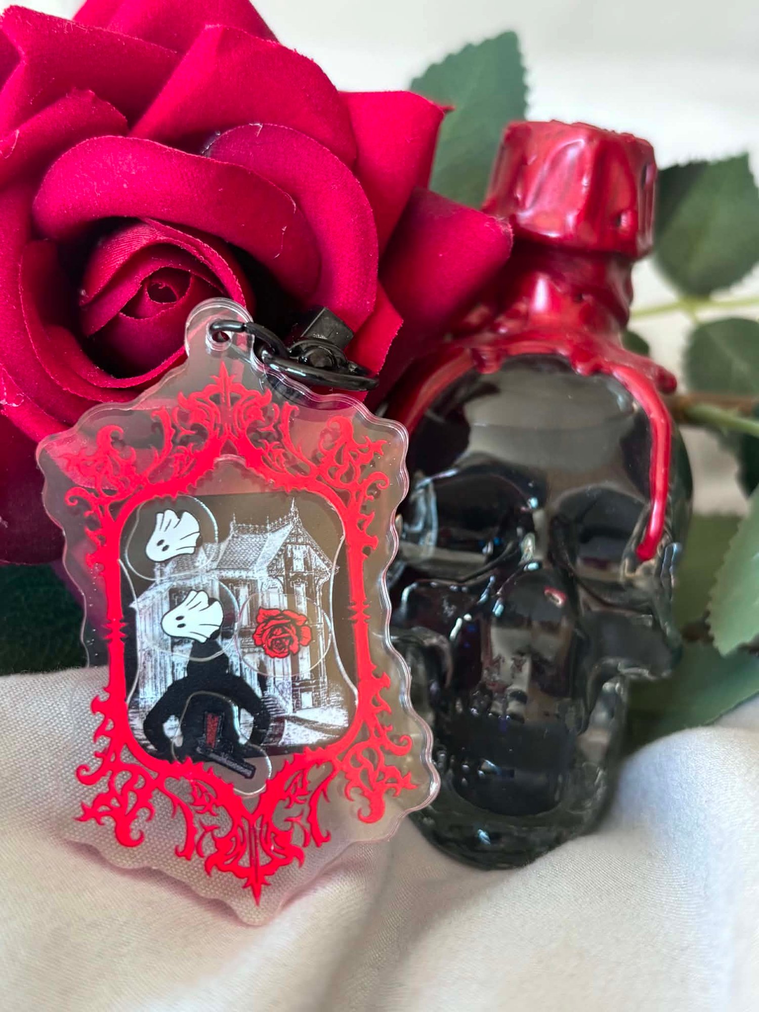 Image of Officially licensed haunting Adeline shaker acrylic keychain 