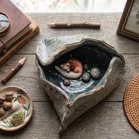 Image 1 of A Fox's Den Ceramic Triangular Sculpture