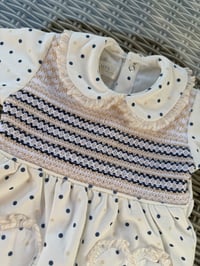 Image 1 of Girls navy/cream dot Babygrow 