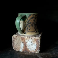 Image 3 of 5 faces sea mug<<<