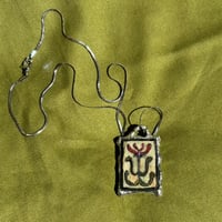 Image 1 of Flower amulet 