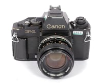 Image 1 of Canon F-1N New 35mm SLR Film Camera with AE Prism + 50mm F1.4 SSC lens #2811