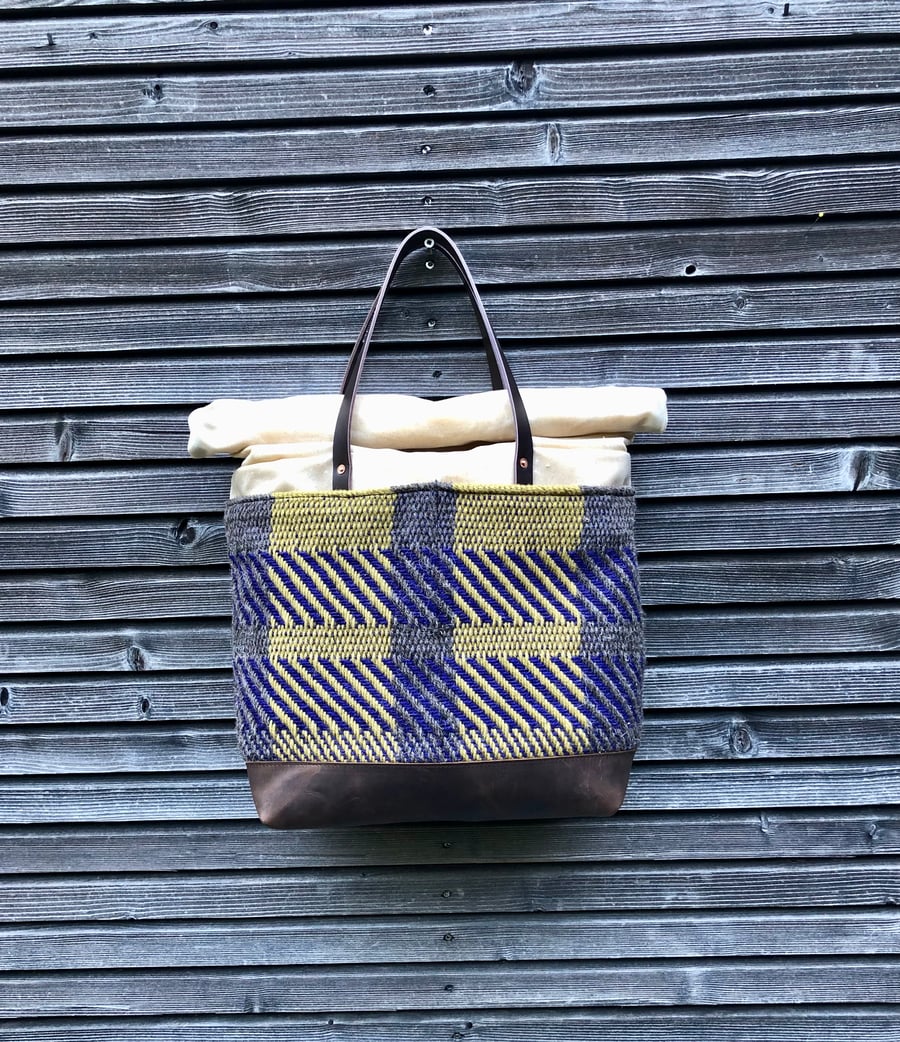 Image of Copy of Carryall in natural waxed canvas with an exterior pocket in handwoven wool fabric