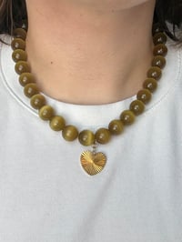 Image 1 of Cat's Eye Glass and Charm
