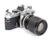 Image 1 of Nikon FM 35mm SLR film camera with Zoom NIKKOR 35-105mm lens TESTED #2871
