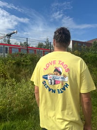 Image 1 of Yellow Edition:  "WE LOVE TAGS AND HATE NAZIS" T-Shirt