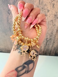 Image 1 of Autism boy or girl gold laminated stretchy bracelet 