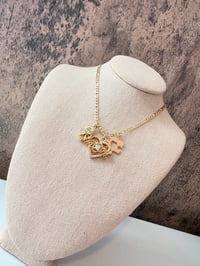 Image 1 of Autism mom heart gold laminated necklace 