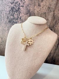 Image 1 of Autism cross with girl gold laminated necklace 