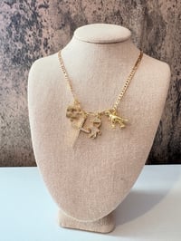 Autism cross Dino boy gold laminated necklace 