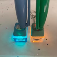 Image 3 of Phainon and Anaxa Light-Up Fidget Keycap Keychain