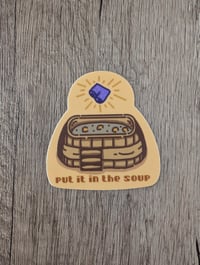 Image 1 of Put it in the Soup - Stardew Valley Purple Shorts Vinyl Sticker
