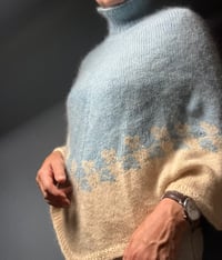 Image 1 of leafy poncho