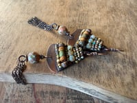 Image 8 of Alegria Alegria in earthy colors earrings. 