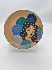 Image 1 of Lady and Blue Flowers 