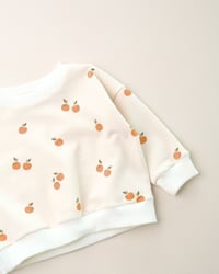 Image 2 of T-shirt Orso · Petites oranges · Coton biologique