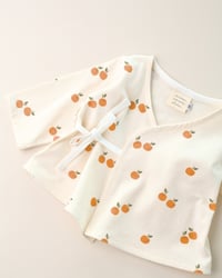 Image 3 of Cache-coeur Isadora · Petites oranges · Coton biologique