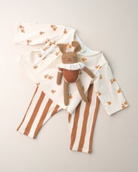 Image 6 of Cache-coeur Isadora · Petites oranges · Coton biologique