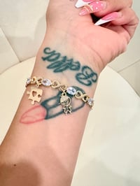 Image 1 of Autism infinity gold laminated bracelet 