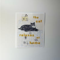 The Cat Relaxes at Home