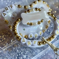Image 3 of Gold Puppy Bone Adult Pacifier