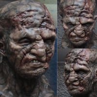 Image 2 of Versus translucent resin bust.