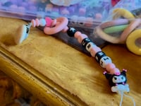Image 1 of Kuromi Sanrio Pacifier Clip