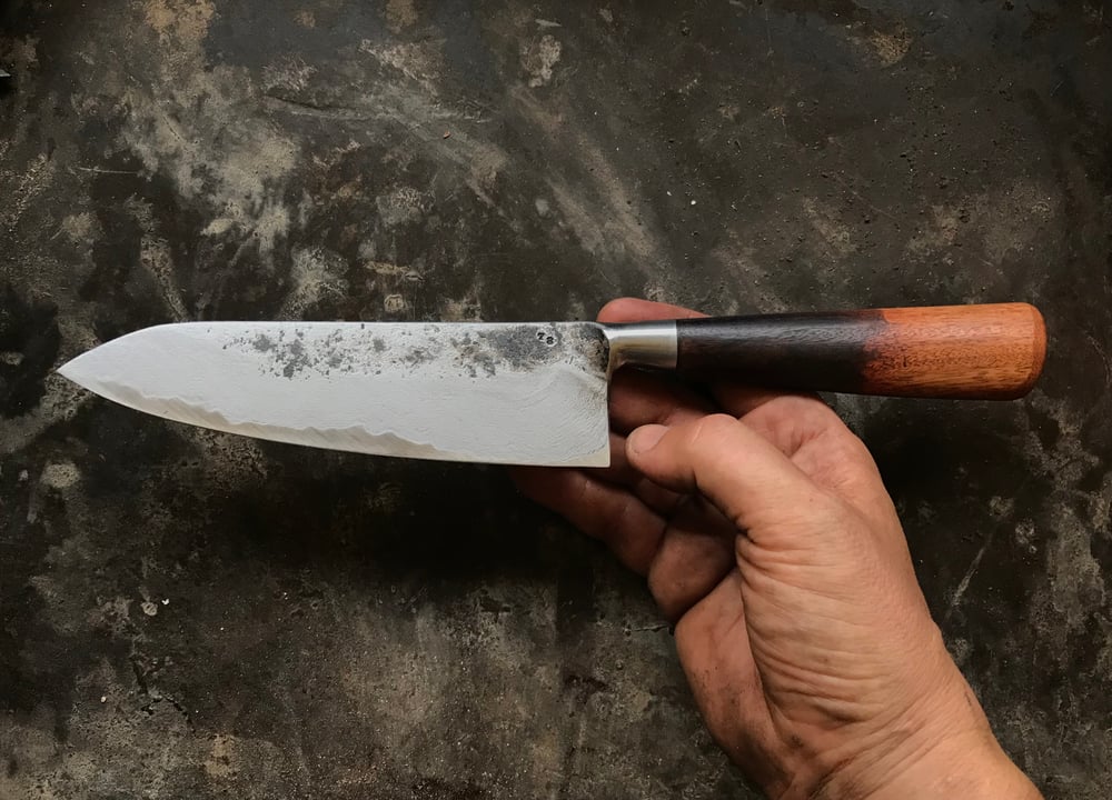 Image of wrought iron clad 78
